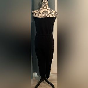 Black jumpsuit by guess runs small